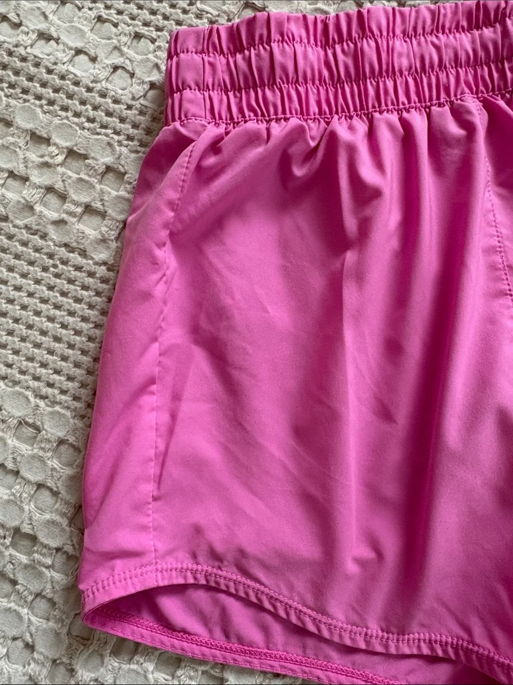 Nike Girl’s Pink Athletic Shorts with White Swoosh